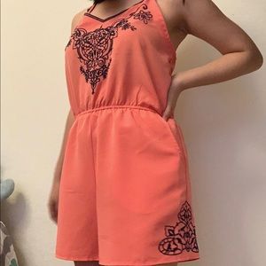 small orange romper